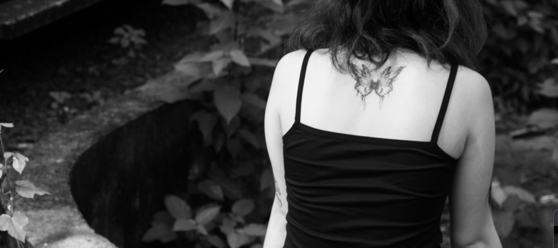 Minimal butterfly outline with sampaguita accent